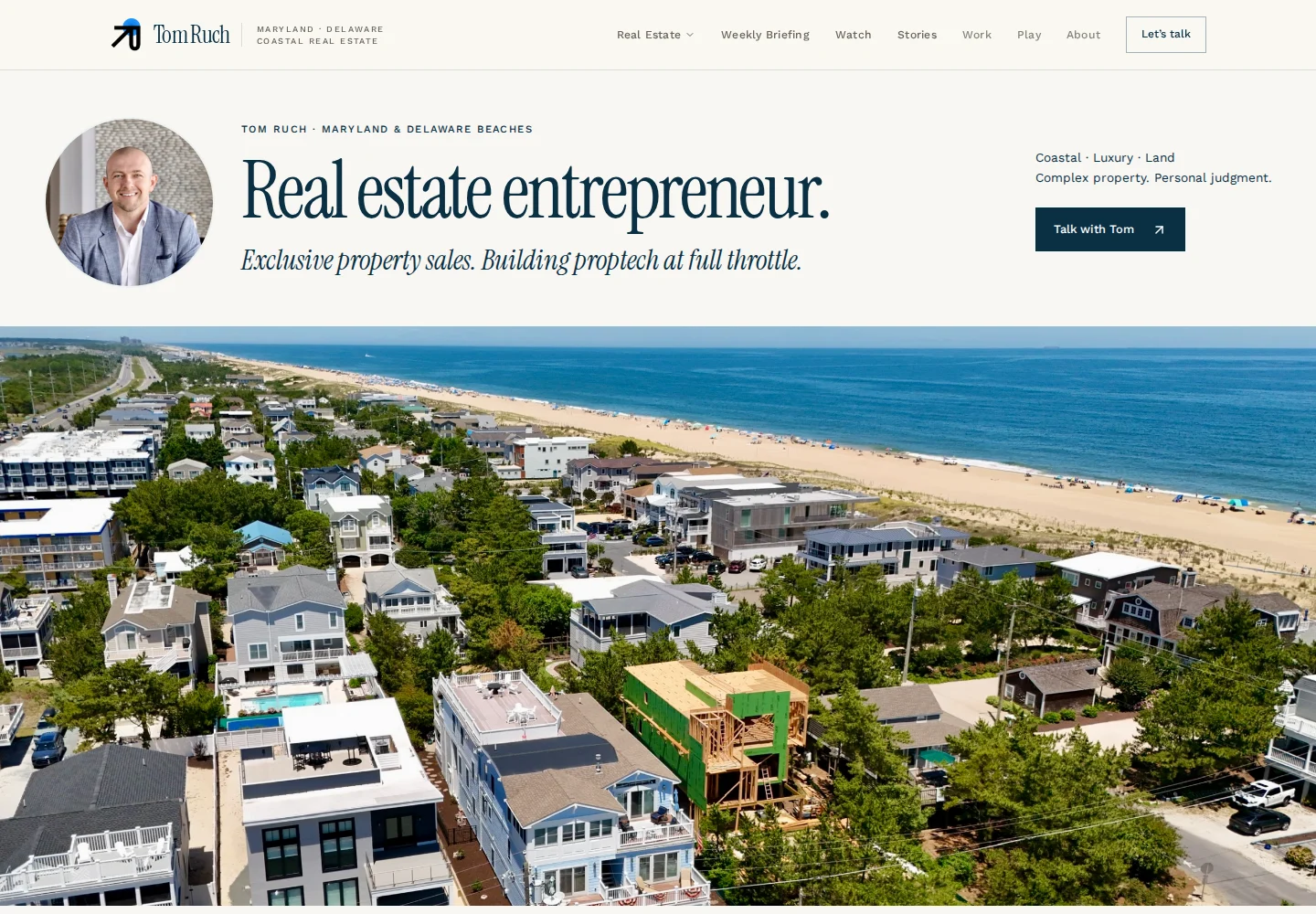 Actual TomRuch.com real estate website with its custom homepage and property marketing